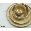 Reactive glazed stoneware dinner set in Khaki